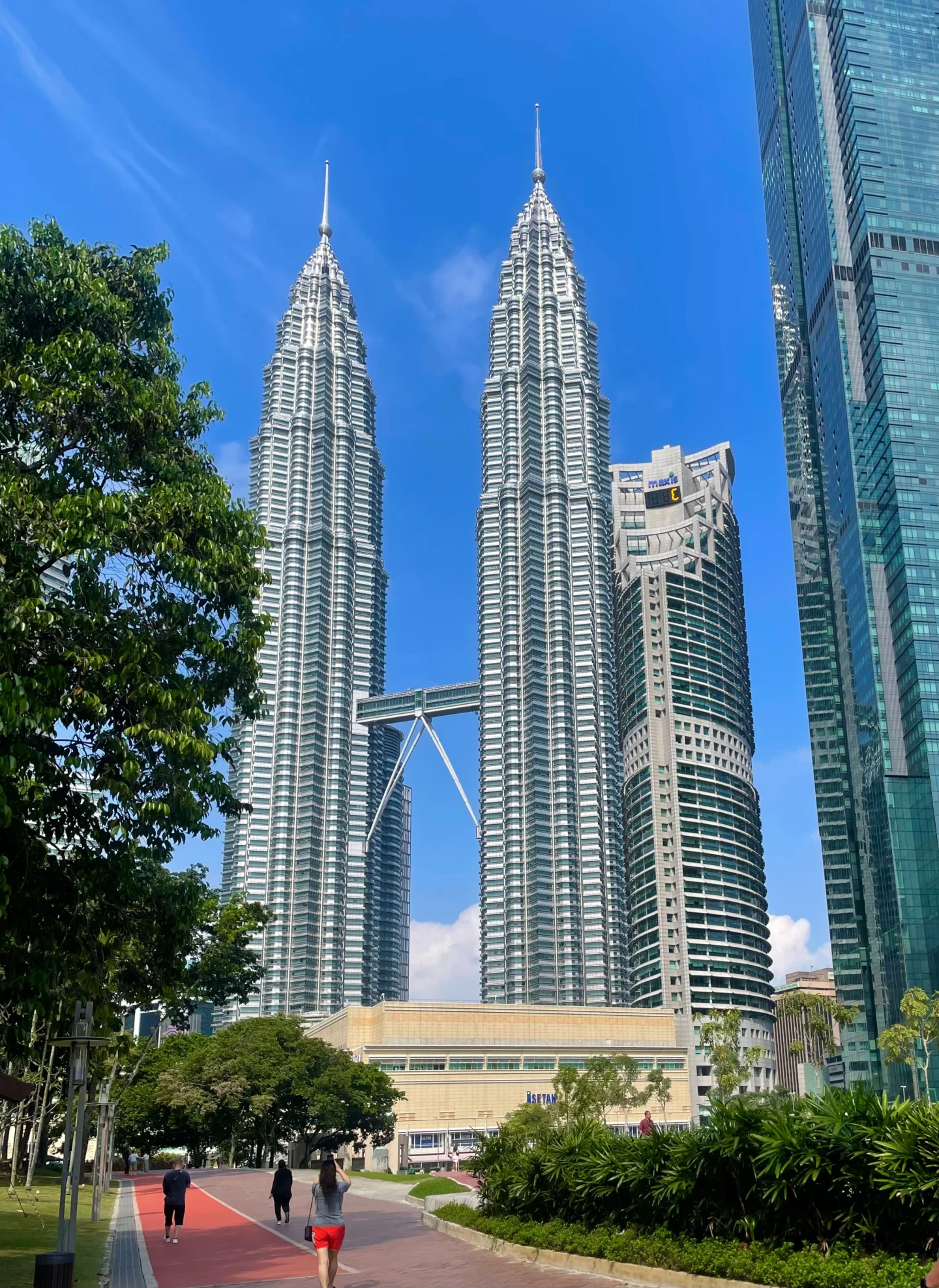 Petronas Twin Towers under a blue sky