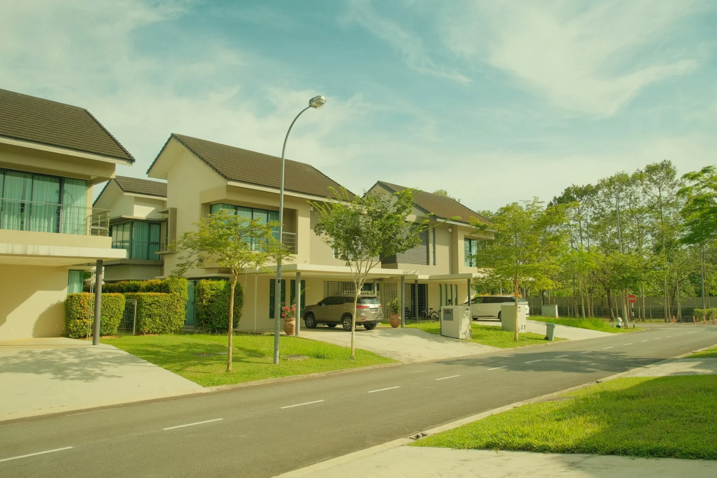 Modern Malaysian homes with landscaped gardens (illustrative)