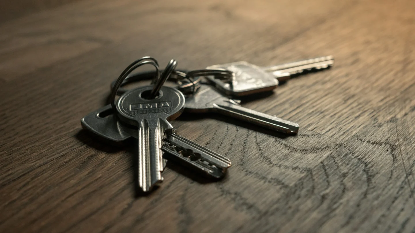 House keys on a wooden table