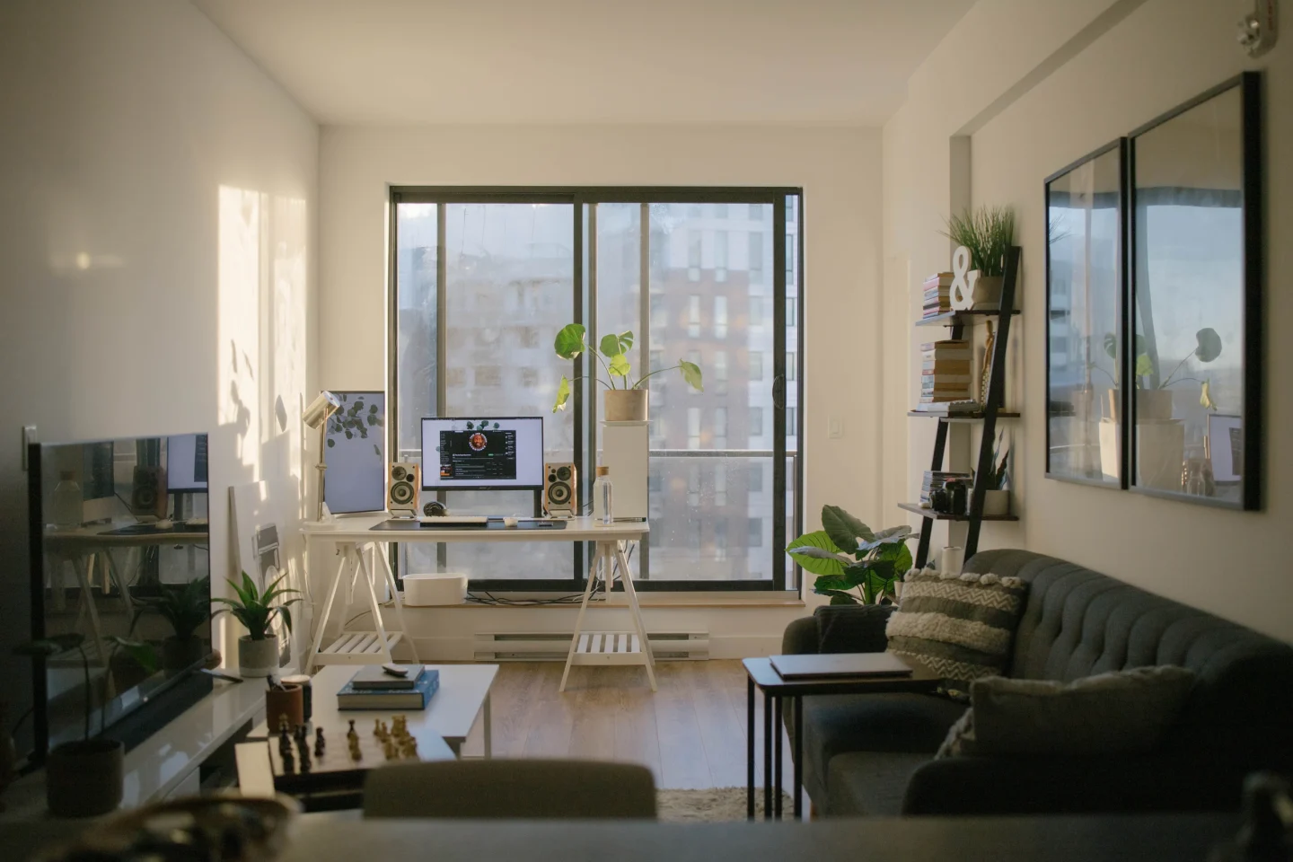 A living room with plants and a sofa (illustrative)